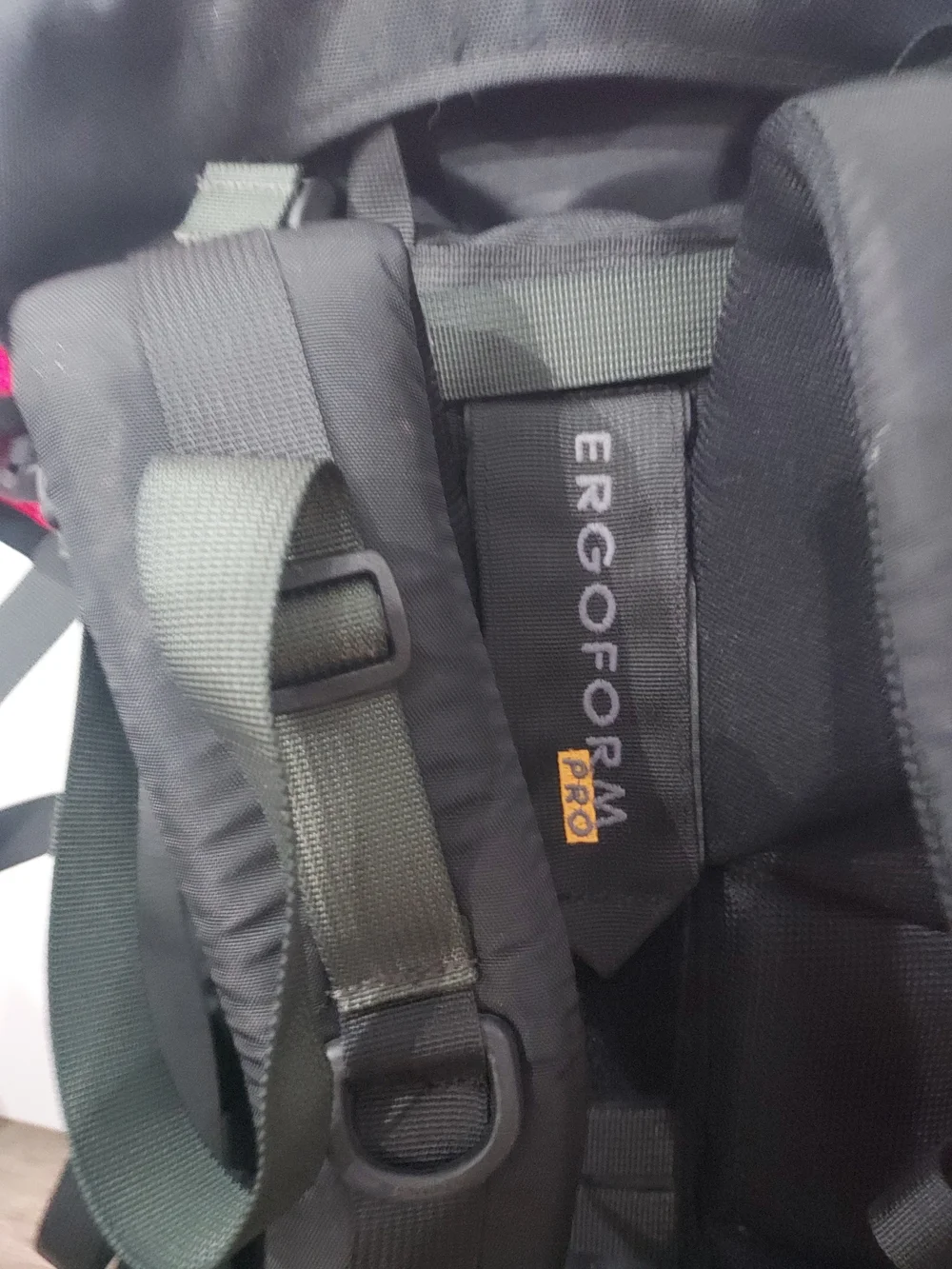 Jack Wolfskin Women's Backpack in Black with Red Panels and Yellow Logo